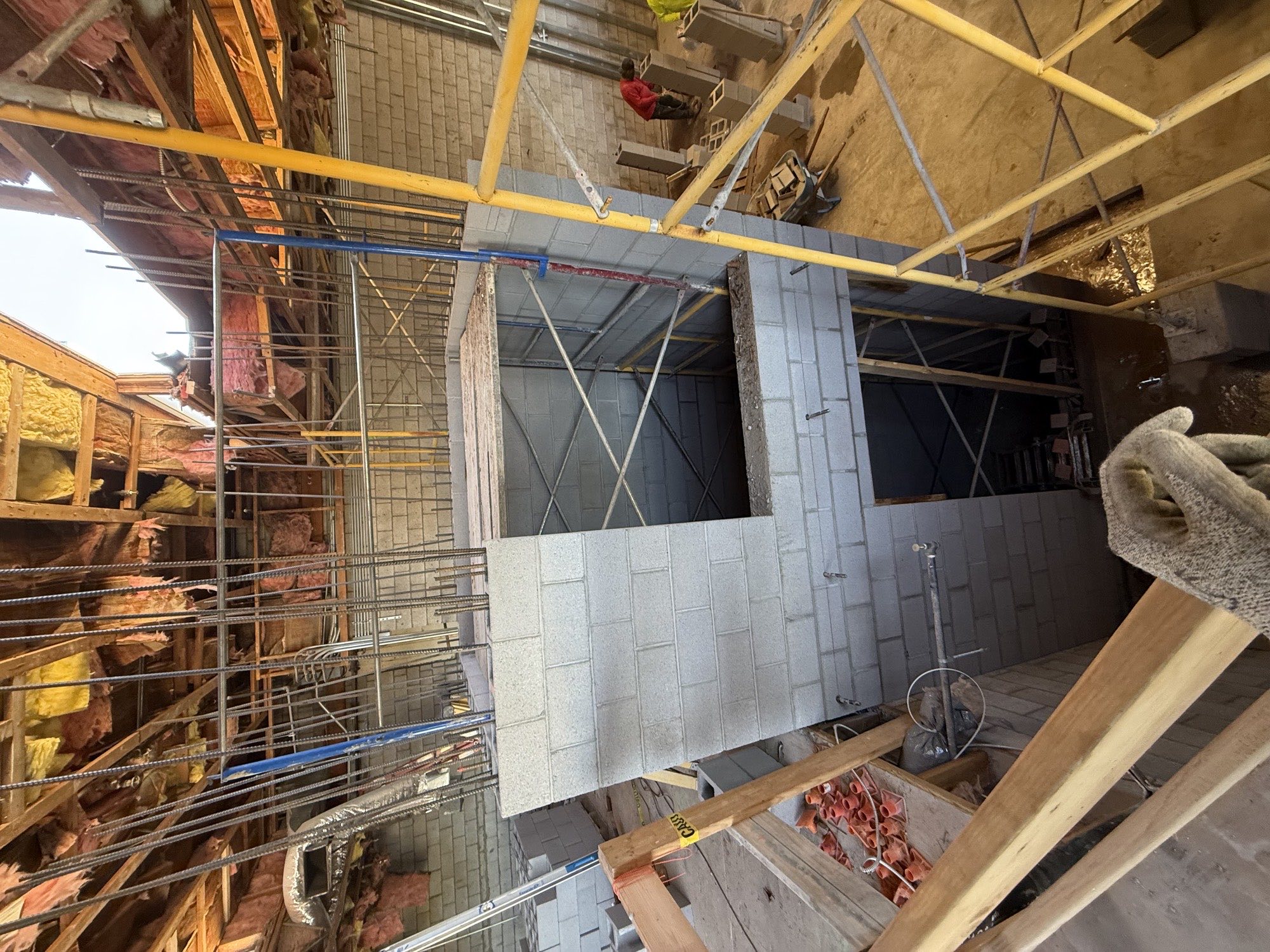 Reinforced CMU elevator shaft under construction